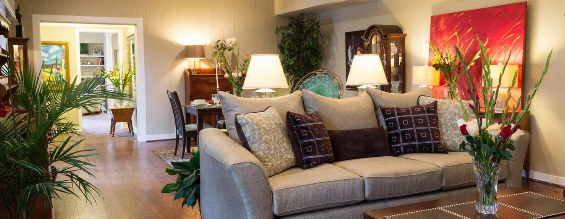 a living room with a couch and coffee table