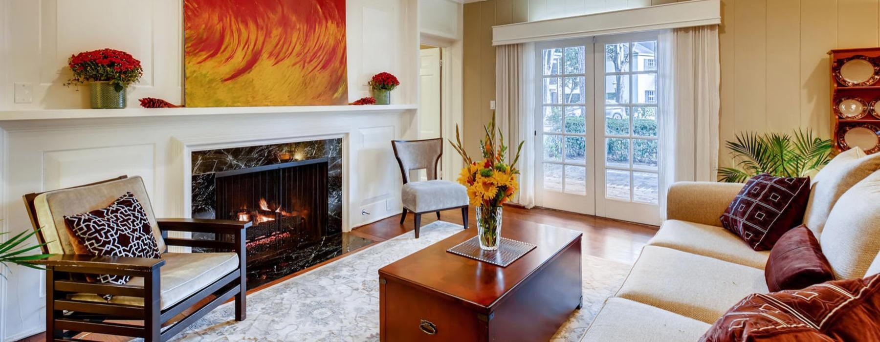 a living room with a fireplace
