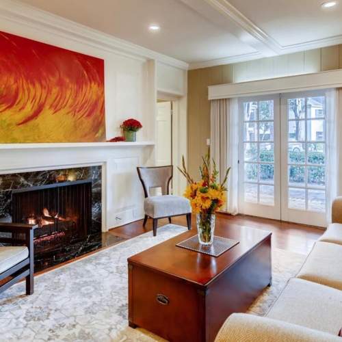 a living room with a fireplace